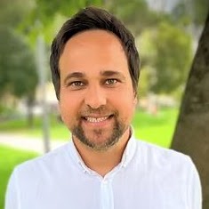 Dr Justin Tomyn